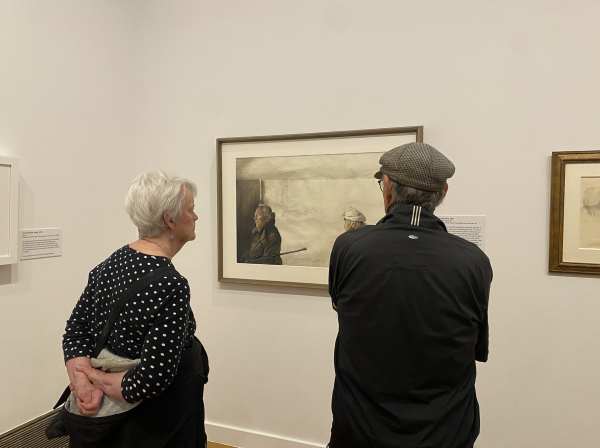 A couple contemplating “The Kuerners” (1971) at the Reynolda House Museum of American Art.